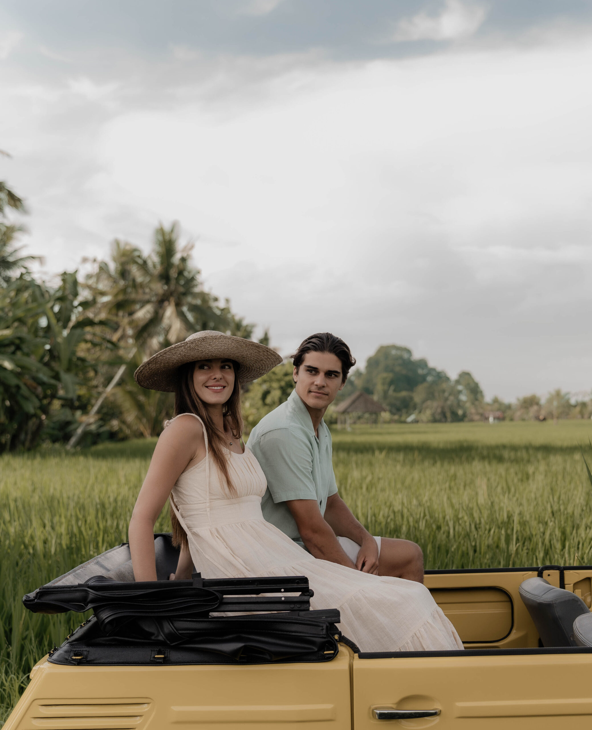 Couple enjoying a scenic drive through the rice fields near Ubud Bali