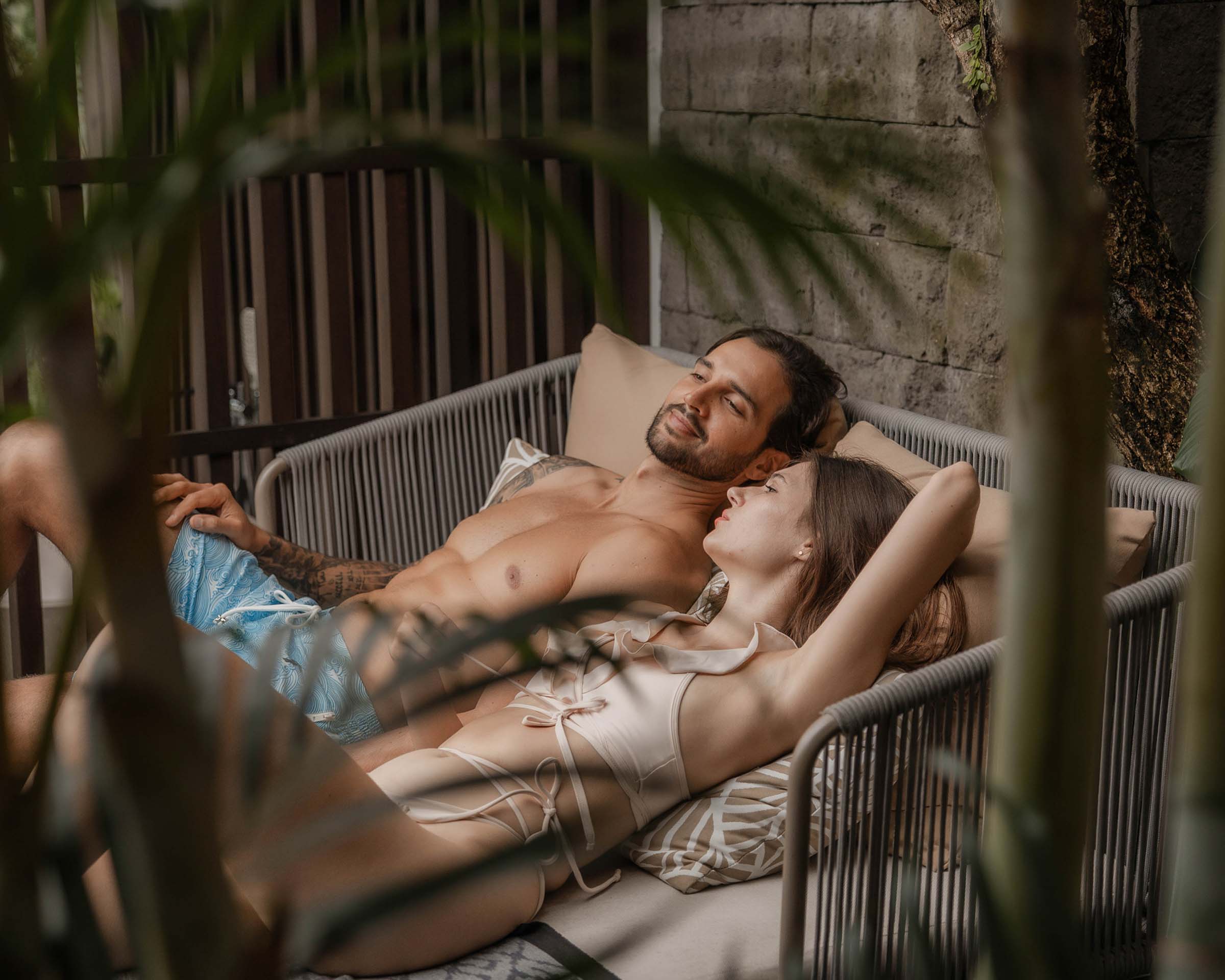 Couple relaxing together in a private outdoor villa setting in Ubud Bali